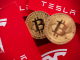 Tesla Writes Down $170M in Bitcoin Impairment Charges in Q2